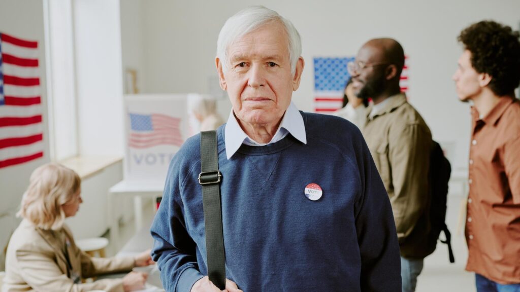 Senior man at polling station