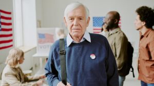 Senior man at polling station