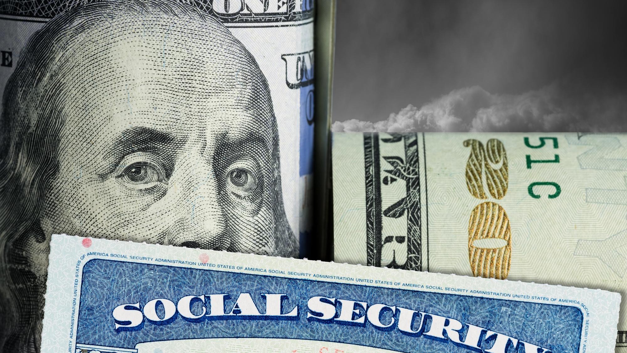 Social Security Card in front of Benjamin Franklin on dollar note