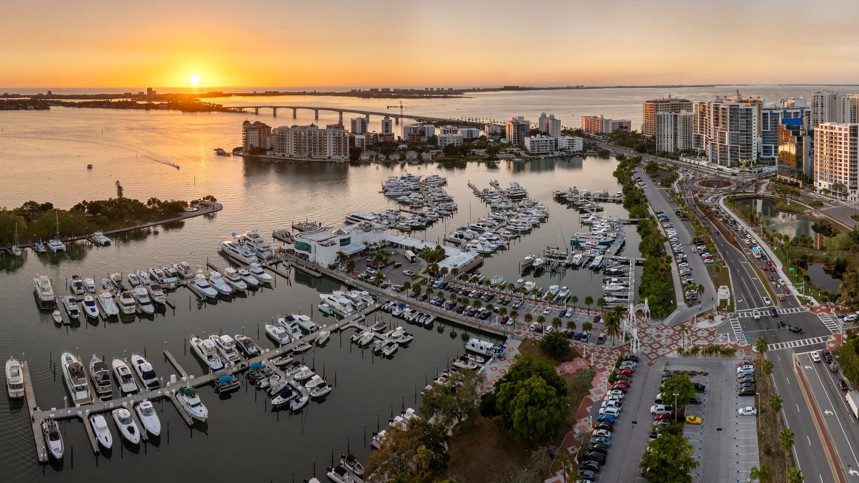 Sarasota Florida at sunset USA travel destination Yachts docked in Sarasota Bay marina American waterfront city downtown architecture Sarasota Florida at sunset USA travel destination Yachts docked in Sarasota Bay marina American waterfront city downtown architecture
